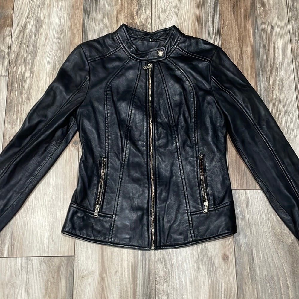 Black leather jacket with gold decal. Guess. Size small.